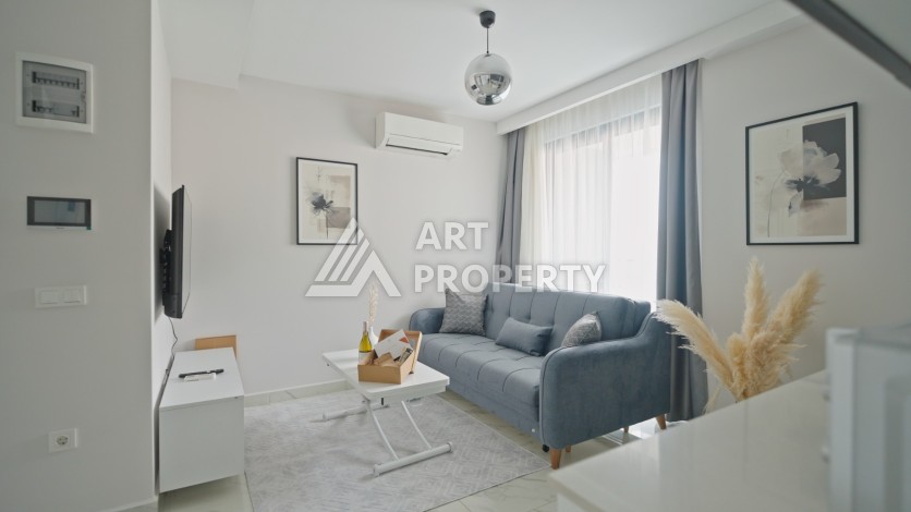 Квартира 1+1 в 200 м от пляжа Клеопатры. Новый дом в центре Алании - Ракурс 17