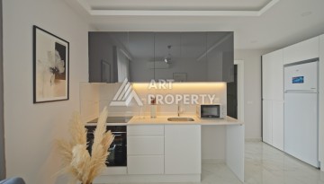 Квартира 1+1 в 200 м от пляжа Клеопатры. Новый дом в центре Алании - Ракурс 20