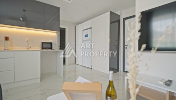 Квартира 1+1 в 200 м от пляжа Клеопатры. Новый дом в центре Алании - Ракурс 22