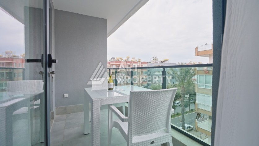 Квартира 1+1 в 200 м от пляжа Клеопатры. Новый дом в центре Алании - Ракурс 22