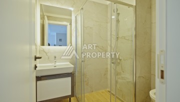 Квартира 1+1 в 200 м от пляжа Клеопатры. Новый дом в центре Алании - Ракурс 27