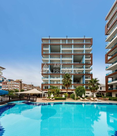 Квартира 1+1 с видом на бассейн, 65 кв.м. Джикджилли, Алания - Ракурс 2