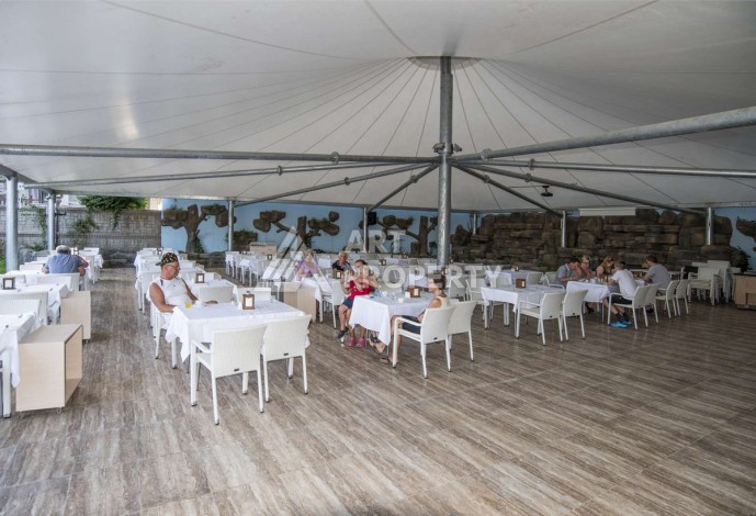 Квартира 1+1 с видом на бассейн, 65 кв.м. Джикджилли, Алания - Ракурс 4