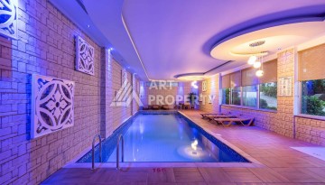 Квартира 1+1 с видом на бассейн, 65 кв.м. Джикджилли, Алания - Ракурс 12