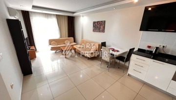 Квартира 1+1 с видом на бассейн, 65 кв.м. Джикджилли, Алания - Ракурс 14