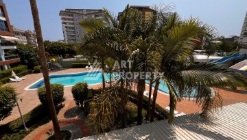 Квартира 1+1 с видом на бассейн, 65 кв.м. Джикджилли, Алания - Ракурс 19