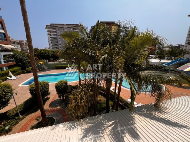 Квартира 1+1 с видом на бассейн, 65 кв.м. Джикджилли, Алания - Ракурс 18