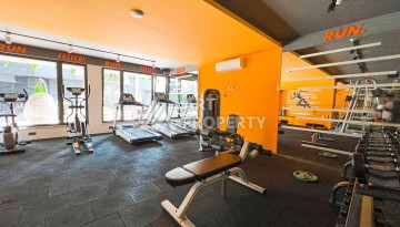 Стильная квартира 1+1 с дизайнерским интерьером в премиальном комплексе у пляжа Клеопатры - Ракурс 5