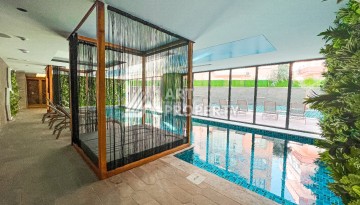 Стильная квартира 1+1 с дизайнерским интерьером в премиальном комплексе у пляжа Клеопатры - Ракурс 6