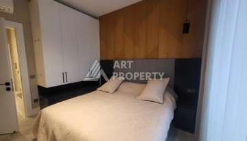 Стильная квартира 1+1 с дизайнерским интерьером в премиальном комплексе у пляжа Клеопатры - Ракурс 8