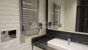 Стильная квартира 1+1 с дизайнерским интерьером в премиальном комплексе у пляжа Клеопатры - Ракурс 12