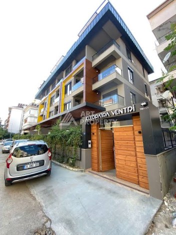 Квартира 1+1 в бутик-комплексе в районе пляжа Клеопатры, 56 кв.м. - Ракурс 1