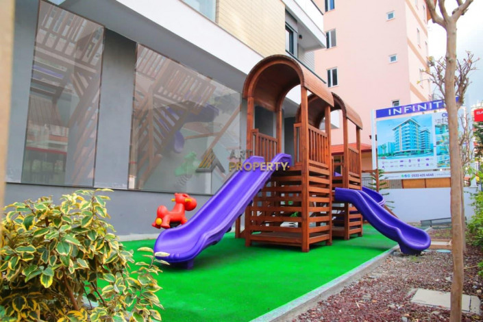 Четырехкомнатная квартира в центре Алании в новом современном комплексе, 120 м2 - Ракурс 26