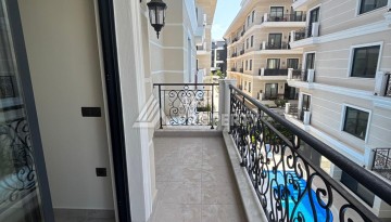 Квартира 1+1 в бутик-комплексе с лицензией на краткосрочную аренду в районе пляжа Клеопатры - Ракурс 18