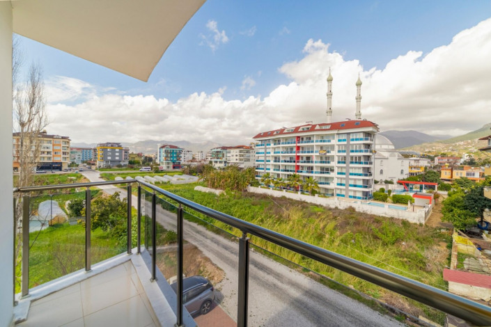 Квартира 1+1 с новой мебелью и прямым видом на море в Кестеле, 65 м2 - Ракурс 4