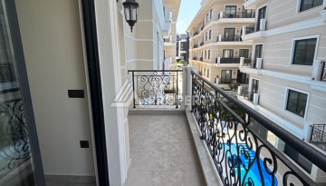 Современная квартира 1+1 в бутик-комплексе с лицензией на краткосрочную аренду у пляжа Клеопатра - Ракурс 32