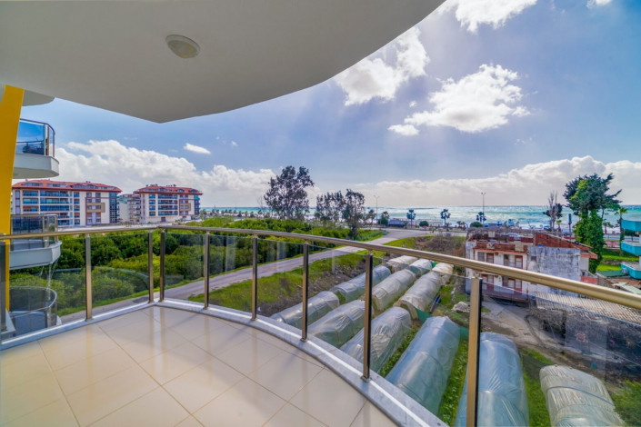 Квартира 1+1 с новой мебелью и прямым видом на море в Кестеле, 65 м2 - Ракурс 15