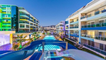 Просторная квартира 1+1 в 300 метрах от моря в районе Кестель, 65 кв.м. - Ракурс 1