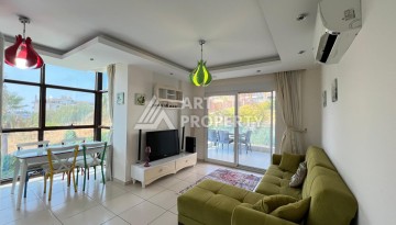 Просторная квартира 1+1 в 300 метрах от моря в районе Кестель, 65 кв.м. - Ракурс 2