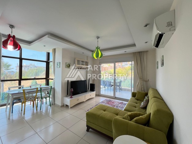 Просторная квартира 1+1 в 300 метрах от моря в районе Кестель, 65 кв.м. - Ракурс 1