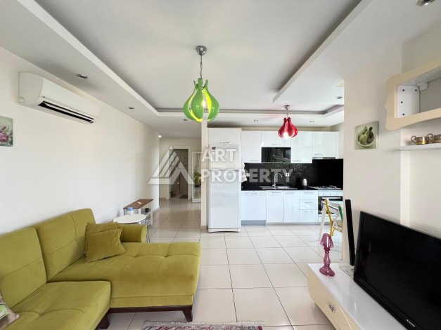 Просторная квартира 1+1 в 300 метрах от моря в районе Кестель, 65 кв.м. - Ракурс 2