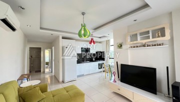 Просторная квартира 1+1 в 300 метрах от моря в районе Кестель, 65 кв.м. - Ракурс 7