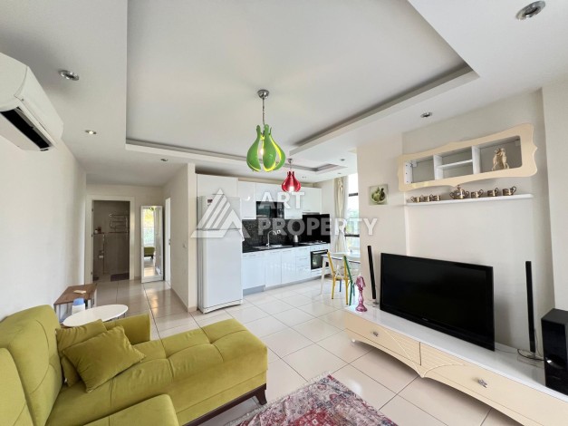 Просторная квартира 1+1 в 300 метрах от моря в районе Кестель, 65 кв.м. - Ракурс 6