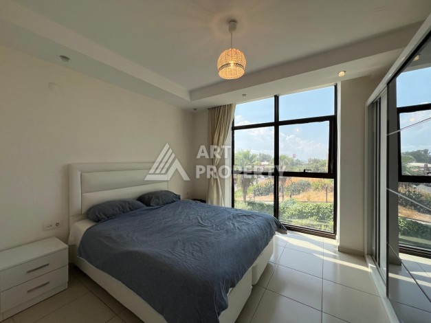 Просторная квартира 1+1 в 300 метрах от моря в районе Кестель, 65 кв.м. - Ракурс 10