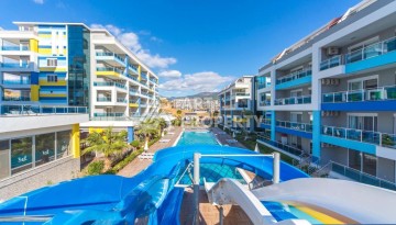 Просторная квартира 1+1 в 300 метрах от моря в районе Кестель, 65 кв.м. - Ракурс 25