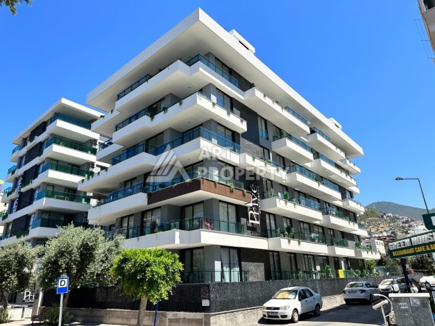 Элитная квартира 1+1 у пляжа Клеопатры в центре Алании, 60 кв.м. - Ракурс 1