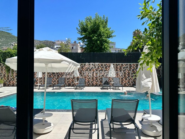 Элитная квартира 1+1 у пляжа Клеопатры в центре Алании, 60 кв.м. - Ракурс 2