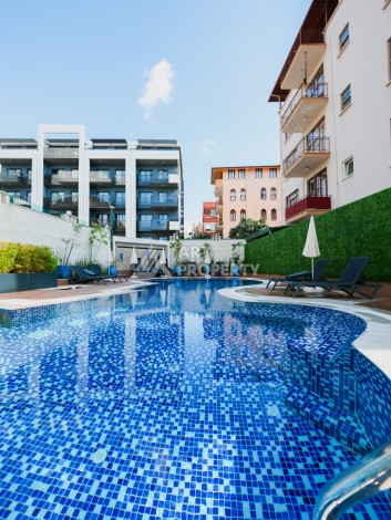 Квартира 1+1 для привилегированной жизни в центре Алании, 250 м от моря - Ракурс 0