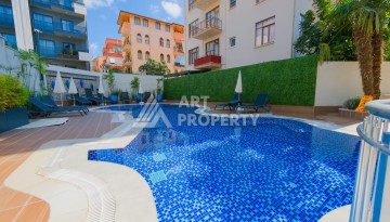 Квартира 1+1 для привилегированной жизни в центре Алании, 250 м от моря - Ракурс 3