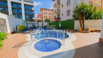 Квартира 1+1 для привилегированной жизни в центре Алании, 250 м от моря - Ракурс 4