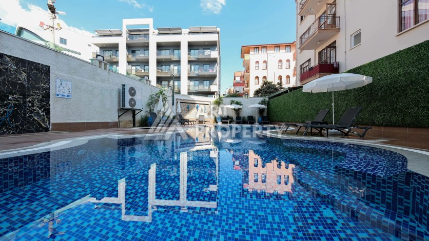 Квартира 1+1 для привилегированной жизни в центре Алании, 250 м от моря - Ракурс 4