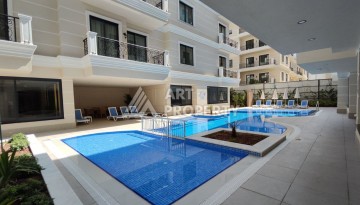 Премиальная квартира 2+1 в 300 м от пляжа Клеопатры в центре Алании - Ракурс 3