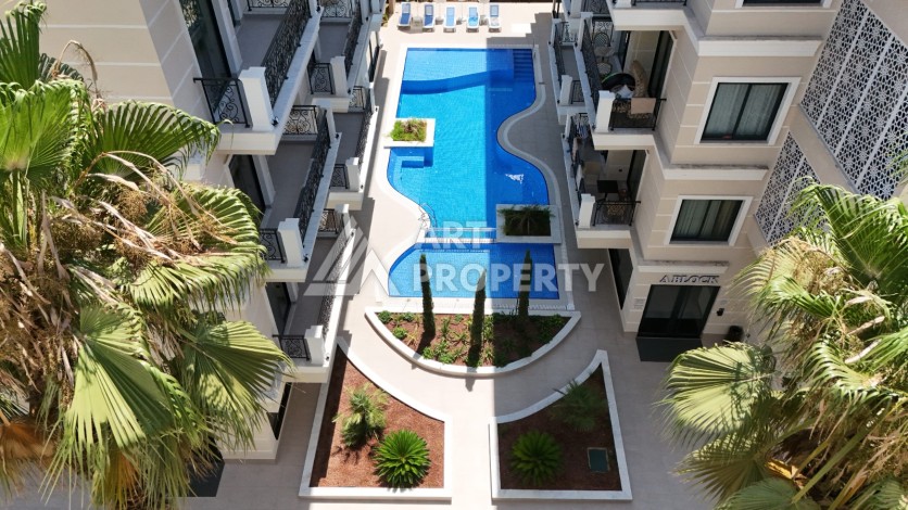 Премиальная квартира 2+1 в 300 м от пляжа Клеопатры в центре Алании - Ракурс 25