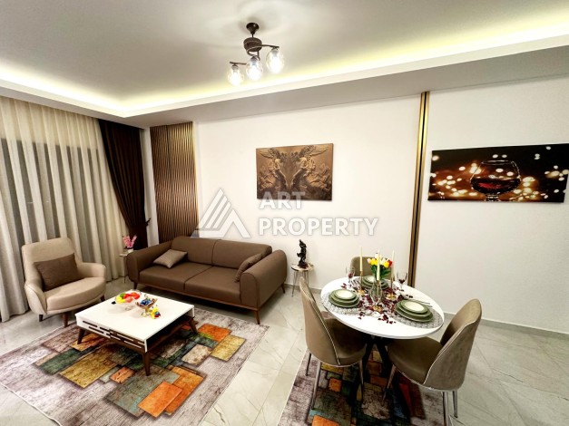 Квартира 1+1 с мебелью и техникой в Махмутларе — 700 м от моря - Ракурс 1