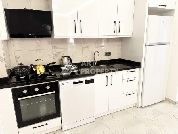 Квартира 1+1 с мебелью и техникой в Махмутларе — 700 м от моря - Ракурс 8