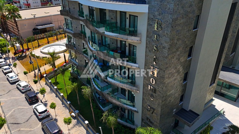 Квартира 1+1 в элитной резиденции в Центре Алании, 100 метров до моря - Ракурс 0