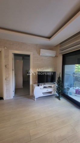 Меблированная квартира 1+1 с приватным садом в центре Алании, 58 кв.м. - Ракурс 3