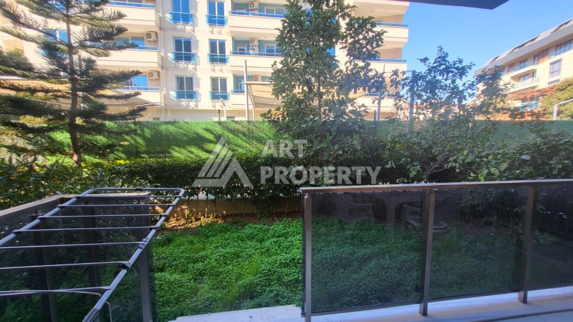 Меблированная квартира 1+1 с приватным садом в центре Алании, 58 кв.м. - Ракурс 9