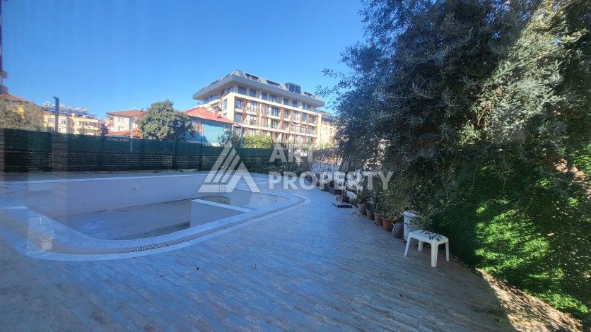 Меблированная квартира 1+1 с приватным садом в центре Алании, 58 кв.м. - Ракурс 18