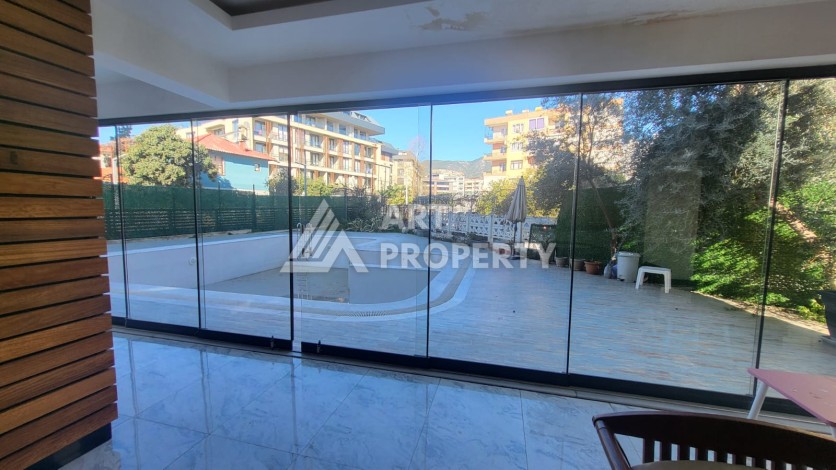 Меблированная квартира 1+1 с приватным садом в центре Алании, 58 кв.м. - Ракурс 21