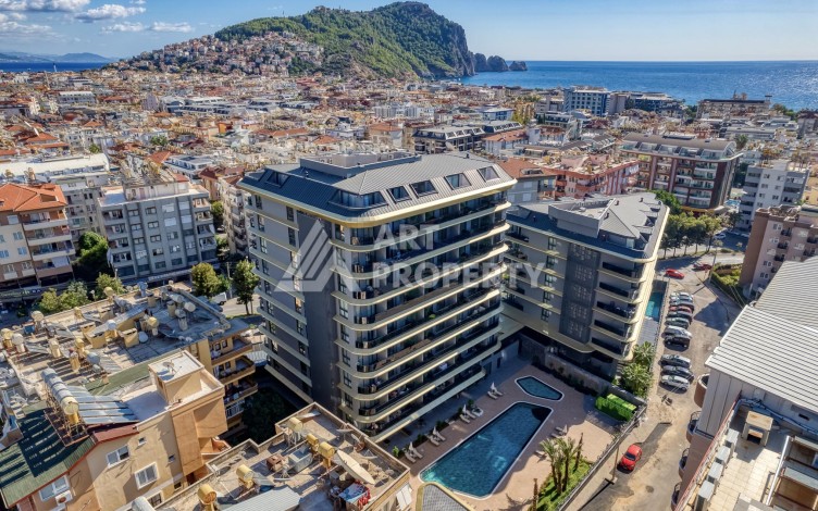 Квартира 1+1 с видом на море и горы в центре Алании, 59 кв.м. - Ракурс 0