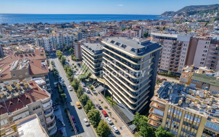 Квартира 1+1 с видом на море и горы в центре Алании, 59 кв.м. - Ракурс 1