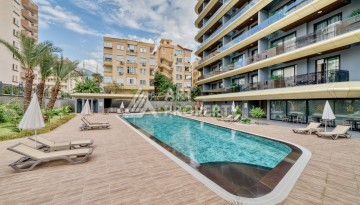 Квартира 1+1 с видом на море и горы в центре Алании, 59 кв.м. - Ракурс 4