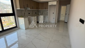 Квартира 1+1 с видом на море и горы в центре Алании, 59 кв.м. - Ракурс 18