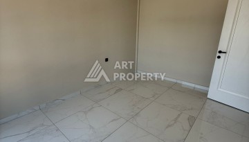 Квартира 1+1 с видом на море и горы в центре Алании, 59 кв.м. - Ракурс 21