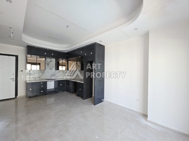 Большая квартира 1+1, 70 кв.м. Премиум резиденция в Махмутларе - Ракурс 11